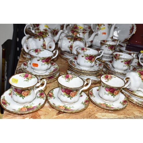 319 - A QUANTITY OF ROYAL ALBERT 'OLD COUNTRY ROSES' PATTERN DINNERWARE, comprising three cake plates, six... 