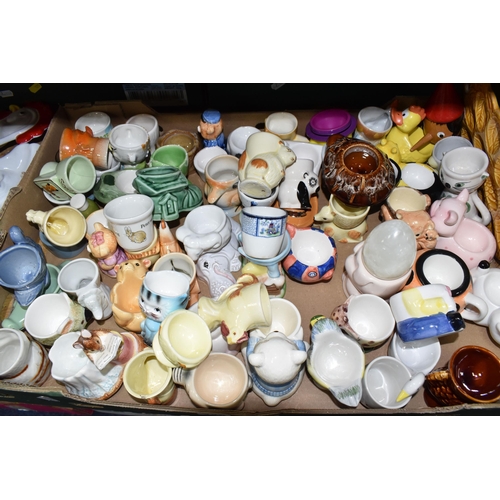 320 - THREE BOXES CONTAINING A COLLECTION OF EGG CUPS, to include two egg platters, approximately two hund... 