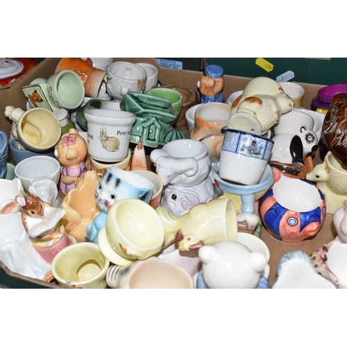 320 - THREE BOXES CONTAINING A COLLECTION OF EGG CUPS, to include two egg platters, approximately two hund... 