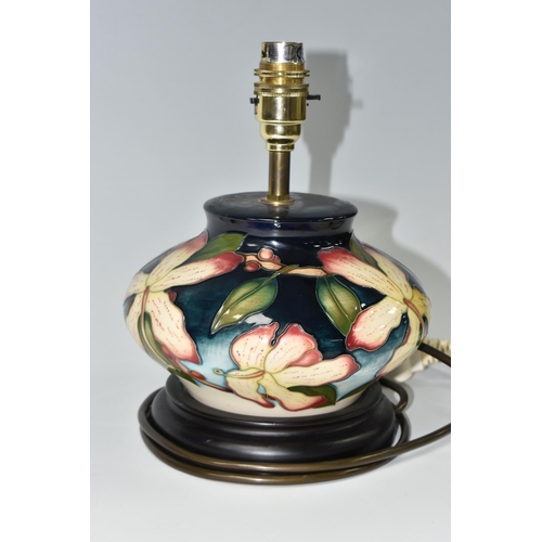 332 - A MOORCROFT POTTERY 'SILK FLOWER' TABLE LAMP, possibly a trial piece, by Anji Davenport, of squat fo... 