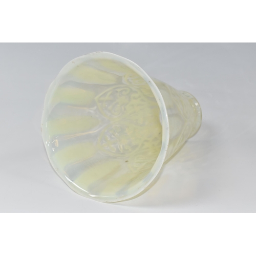 350 - A VASELINE GLASS LIGHT SHADE, the uranium glass light shade of tapering bell form, with slightly wav... 