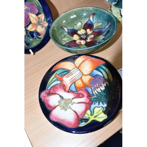 353 - THREE PIECES OF MOORCROFT POTTERY, comprising a small footed bowl in the Columbine pattern, impresse... 