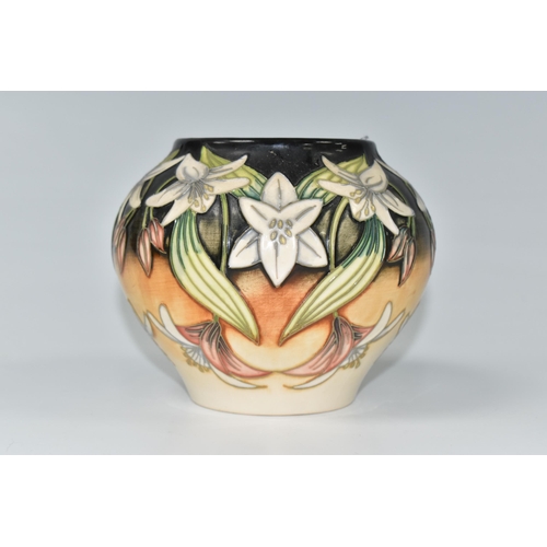 354 - A MOORCROFT POTTERY LIMITED EDITION VASE, in the Scrambling Lily pattern by Anji Davenport, of squat... 