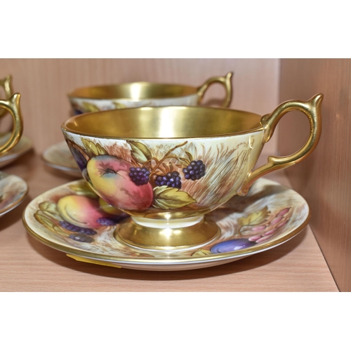 357 - SEVEN AYNSLEY ORCHARD GOLD TEACUPS AND SAUCERS, each teacup with gilt interior, rim, handle and foot... 