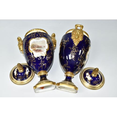 362 - A PAIR OF COALPORT COVERED VASES, of urn form with twin gilt ram's head handles, on a square pedesta... 