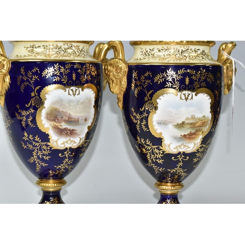 362 - A PAIR OF COALPORT COVERED VASES, of urn form with twin gilt ram's head handles, on a square pedesta... 