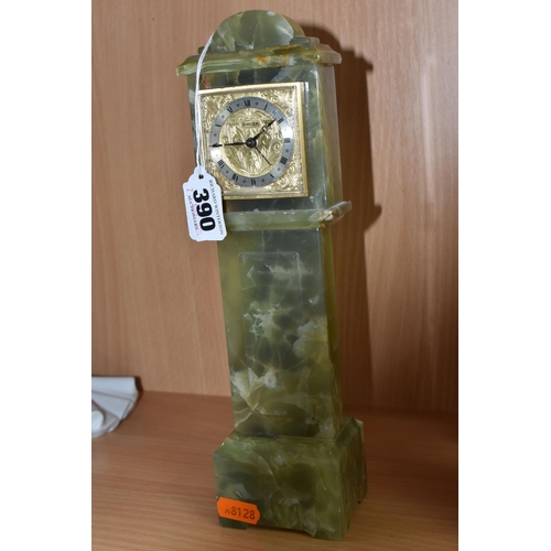 390 - A GREEN ONYX ORNAMENTAL MINIATURE 'SWIZA' CLOCK height 28cm, with a plastic bevel, Arabic numerals t... 