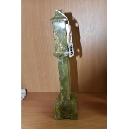 390 - A GREEN ONYX ORNAMENTAL MINIATURE 'SWIZA' CLOCK height 28cm, with a plastic bevel, Arabic numerals t... 