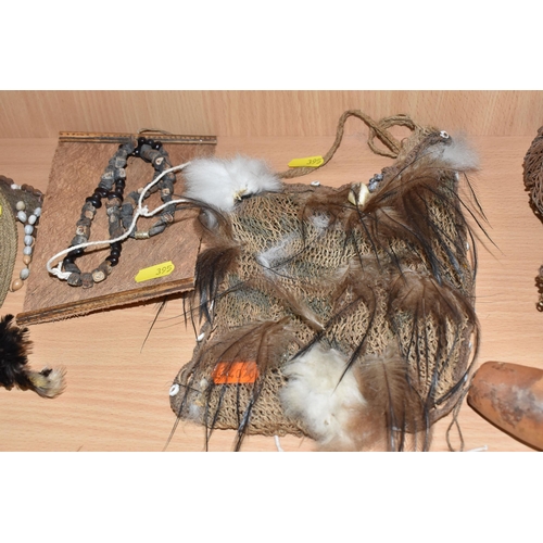 395 - A GROUP OF ITEMS FROM THE DANI TRIBE, WESTERN PAPUA NEW GUINEA, INDONESIA comprising a traditional '... 