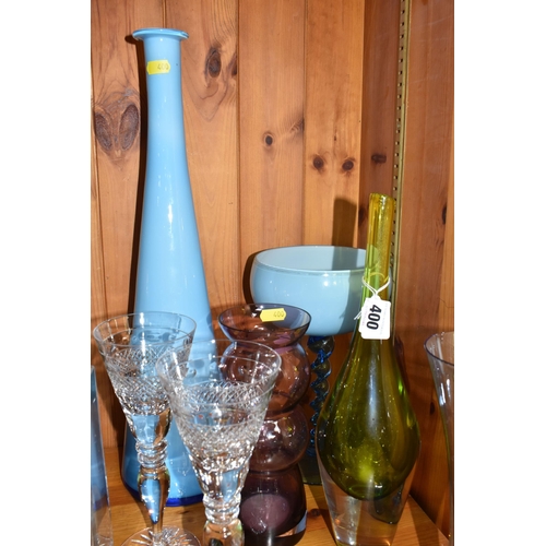 400 - A GROUP OF MIXED MOSTLY COLOURED GLASSWARE to include a pair of crystal cut wine glasses, a blue cas... 