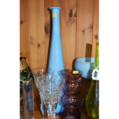 400 - A GROUP OF MIXED MOSTLY COLOURED GLASSWARE to include a pair of crystal cut wine glasses, a blue cas... 