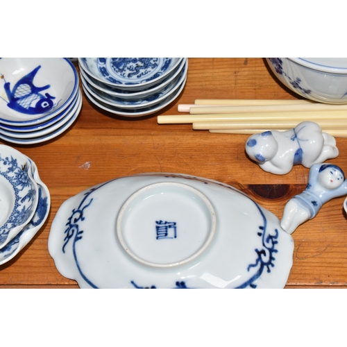 402 - A LARGE QUANTITY OF BLUE AND WHITE MOSTLY CHINESE CERAMICS to include three blue and white bowls wit... 