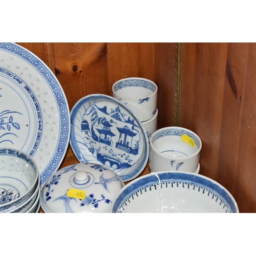 402 - A LARGE QUANTITY OF BLUE AND WHITE MOSTLY CHINESE CERAMICS to include three blue and white bowls wit... 