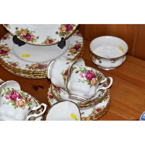 403 - A GROUP OF ROYAL ALBERT 'OLD COUNTRY ROSES' TEA WARES AND PLATES to include a milk jug, a sugar bowl... 