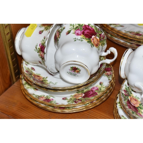 403 - A GROUP OF ROYAL ALBERT 'OLD COUNTRY ROSES' TEA WARES AND PLATES to include a milk jug, a sugar bowl... 