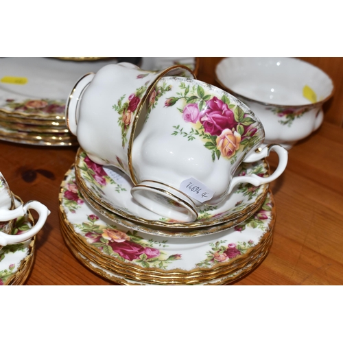 403 - A GROUP OF ROYAL ALBERT 'OLD COUNTRY ROSES' TEA WARES AND PLATES to include a milk jug, a sugar bowl... 