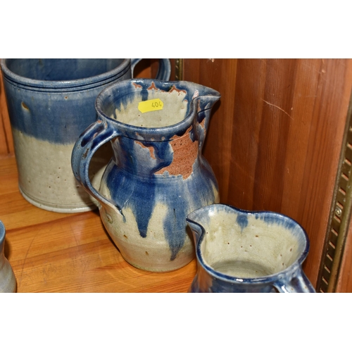 404 - A GROUP OF STUDIO POTTERY to include a 'Lauriana' coffee pot, two mugs by Phillip Laureston with a d... 