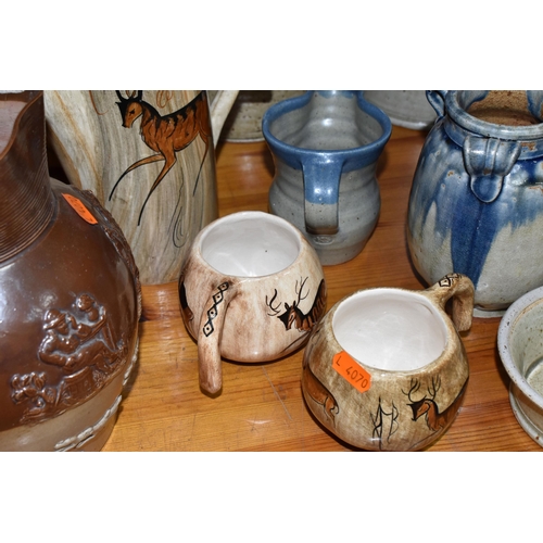 404 - A GROUP OF STUDIO POTTERY to include a 'Lauriana' coffee pot, two mugs by Phillip Laureston with a d... 