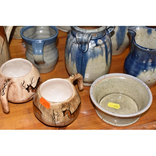 404 - A GROUP OF STUDIO POTTERY to include a 'Lauriana' coffee pot, two mugs by Phillip Laureston with a d... 