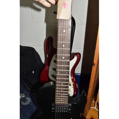 406 - TWO ELECTRIC GUITARS comprising an Ibanez 'Roadstar II' marked H831252 to the reverse, red body with... 