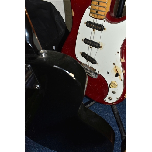 406 - TWO ELECTRIC GUITARS comprising an Ibanez 'Roadstar II' marked H831252 to the reverse, red body with... 