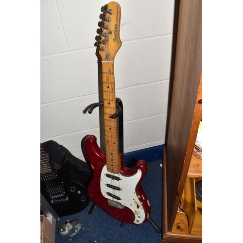 406 - TWO ELECTRIC GUITARS comprising an Ibanez 'Roadstar II' marked H831252 to the reverse, red body with... 