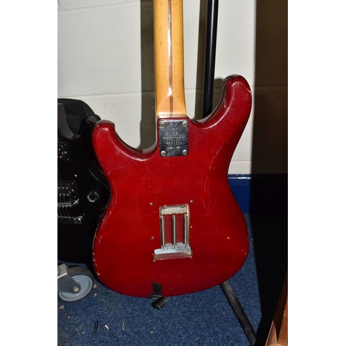 406 - TWO ELECTRIC GUITARS comprising an Ibanez 'Roadstar II' marked H831252 to the reverse, red body with... 