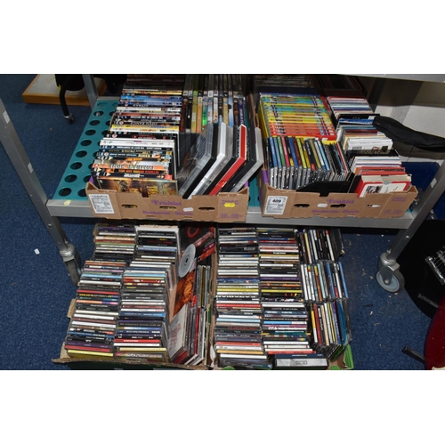 409 - FOUR BOXES OF CDS AND DVDS to include two boxes of approximately fifty DVDS comprising various war, ... 