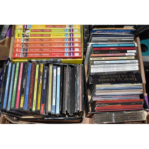 409 - FOUR BOXES OF CDS AND DVDS to include two boxes of approximately fifty DVDS comprising various war, ... 