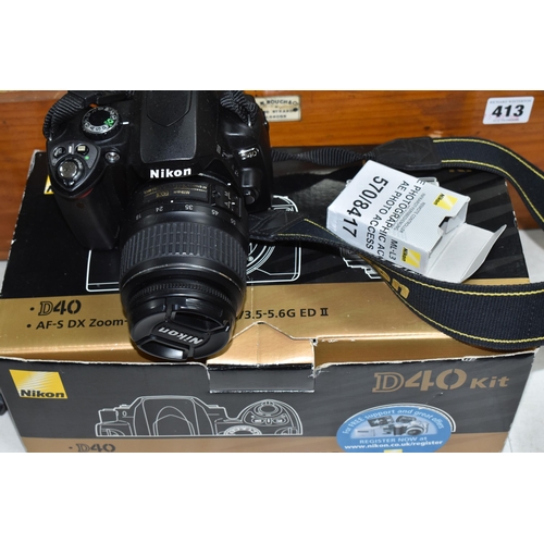 414 - A BOXED NIKON D40 KIT comprising a Nikon D40 digital camera fitted with an ED 18-55mm 1:3.5-6.6 lens... 