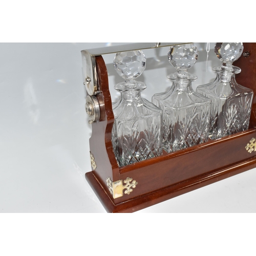 446 - A MODERN PLATED TANTALUS WITH THREE SQUARE DECANTERS, height 33cm (to top of handle) x width 38cm x ... 