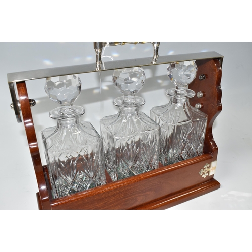 446 - A MODERN PLATED TANTALUS WITH THREE SQUARE DECANTERS, height 33cm (to top of handle) x width 38cm x ... 