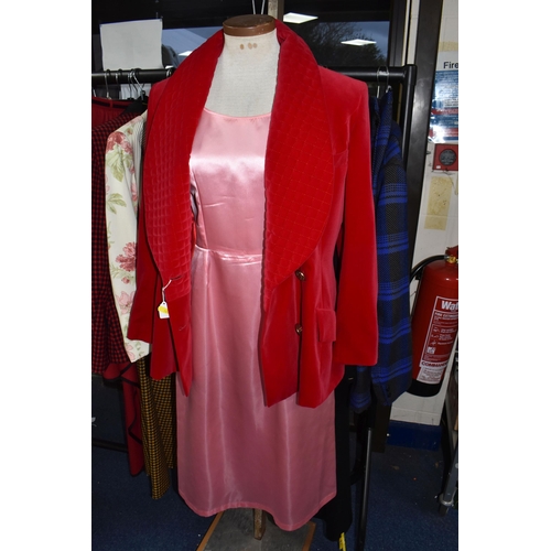 464 - A LARGE QUANTITY OF LADIES CLOTHING, comprising evening jackets, overcoats, casual jackets, skirt su... 