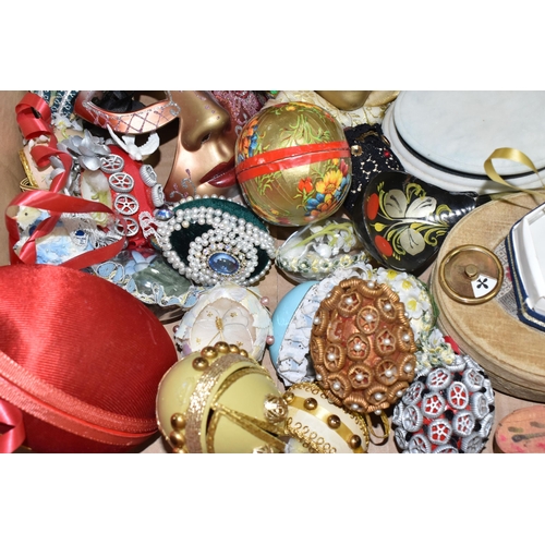 479 - THREE BOXES OF MISCELLANEOUS ITEMS, to include decorative egg shaped ornaments, porcelain mask wall ... 