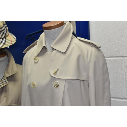 485 - A LADIES' BURBERRY'S TRENCH COAT, HAT YSL UMBRELLA AND AN AQUASCUTUM QUILTED JACKET, comprising a be... 