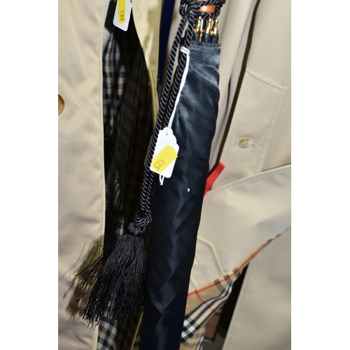 485 - A LADIES' BURBERRY'S TRENCH COAT, HAT YSL UMBRELLA AND AN AQUASCUTUM QUILTED JACKET, comprising a be... 