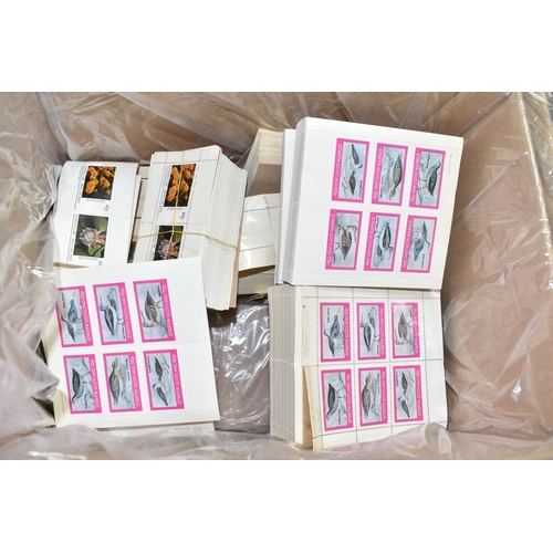 492 - FOUR BOXES OF 'CINDERELLA/LOCALS' STAMPS comprising thousands of perforated and sticker style stamps... 