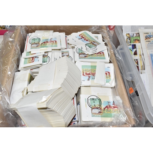 492 - FOUR BOXES OF 'CINDERELLA/LOCALS' STAMPS comprising thousands of perforated and sticker style stamps... 