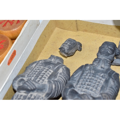 501 - A CHINESE XIANGQI CHESS SET AND TERRACOTTA WARRIOR FIGURES comprising a set of thirty-two piece wood... 