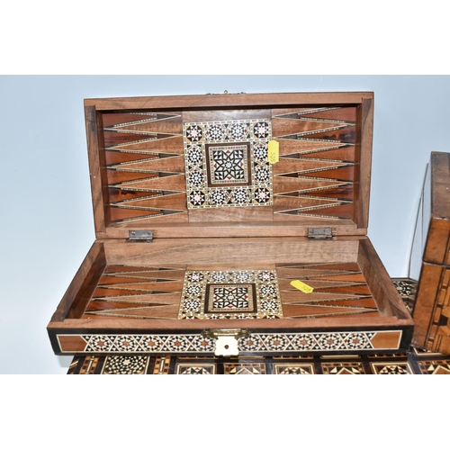 505 - TWO MIDDLE EASTERN BACKGAMMON BOARDS, comprising a large 1970's inlaid games box with chess board to... 