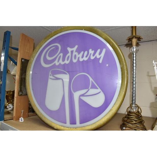 518 - A CADBURY ILLUMINATED ADVERTISING SIGN, the double-sided Perspex sign featuring the Cadbury glasses ... 