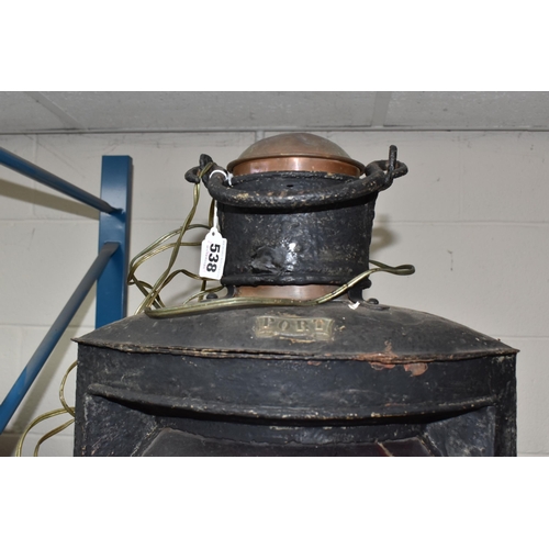 538 - A LARGE SHIP'S METAL LANTERN, painted black and converted to electricity, oil lamp and brass reflect... 