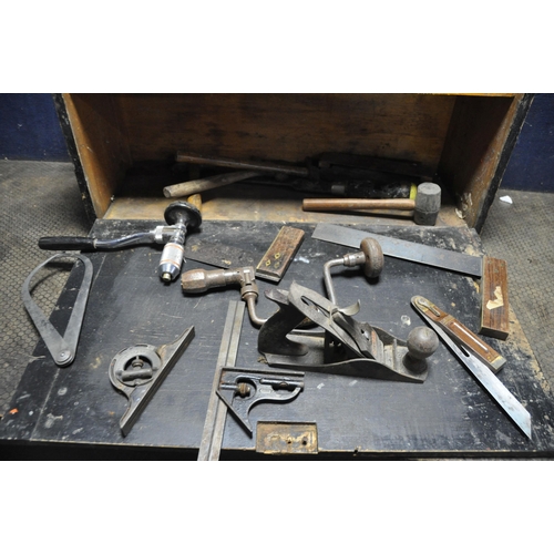 1056 - A VINTAGE WOODEN CARPENTERS TOOLBOX CONTAINING TOOLS including a Stanley 02-716 right angle brace, a... 