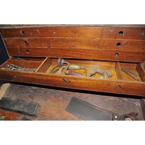 1058 - A VINTAGE CARPENTERS TOOLBOX CONTAINING TOOLS, including four internal drawer, brace and bits, a Mat... 