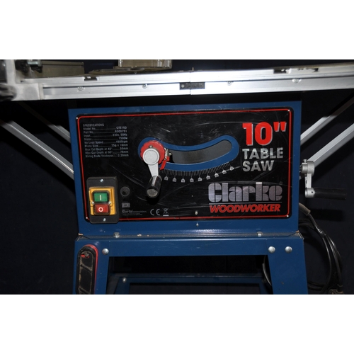 1059 - A CLARKE CTS100 10in TABLE SAW with stand and two extension wings, detached blade fence, parallel gu... 