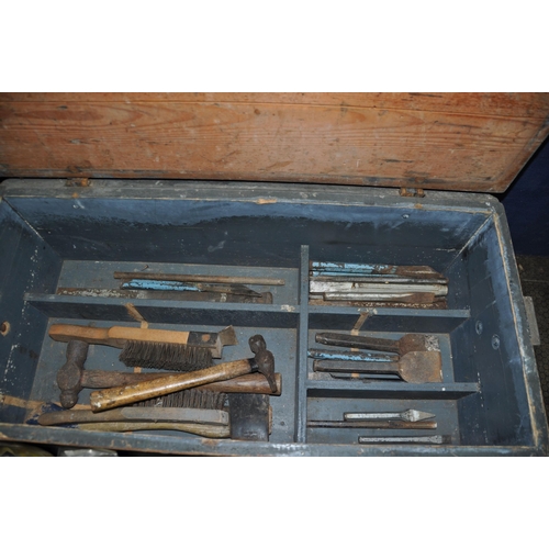 1064 - A VINTAGE WOODEN TOOLCHEST CONTAINING TOOLS including three spear and Jackson saws, Elliott pliers, ... 