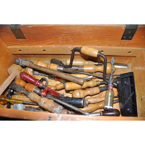 1065 - A WOODEN TOOLCHEST WITH ONE TRAY CONTAINING TOOLS including Record and Stanley hand drills, a box of... 