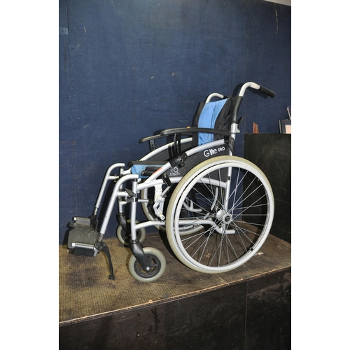 1085 - AN EXCEL VAN OS G LITE PRO FOLDING WHEELCHAIR with two footrests