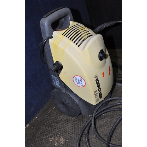 1086 - A KARCHER 520M PRESSURE WASHER with lance and a Morrisons microwave (both PAT pass and working) (2)