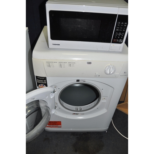 1089 - A HOTPOINT FETV60 TUMBLE DRYER width 60cm, depth 55cm, height 85cm and a Toshiba microwave (both PAT... 